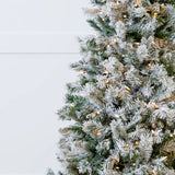 6 FT Flocked Tree Pre Lit Clear Lights